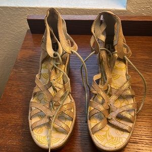 Worn twice. Beautiful Fly London sandals . Too high for me.